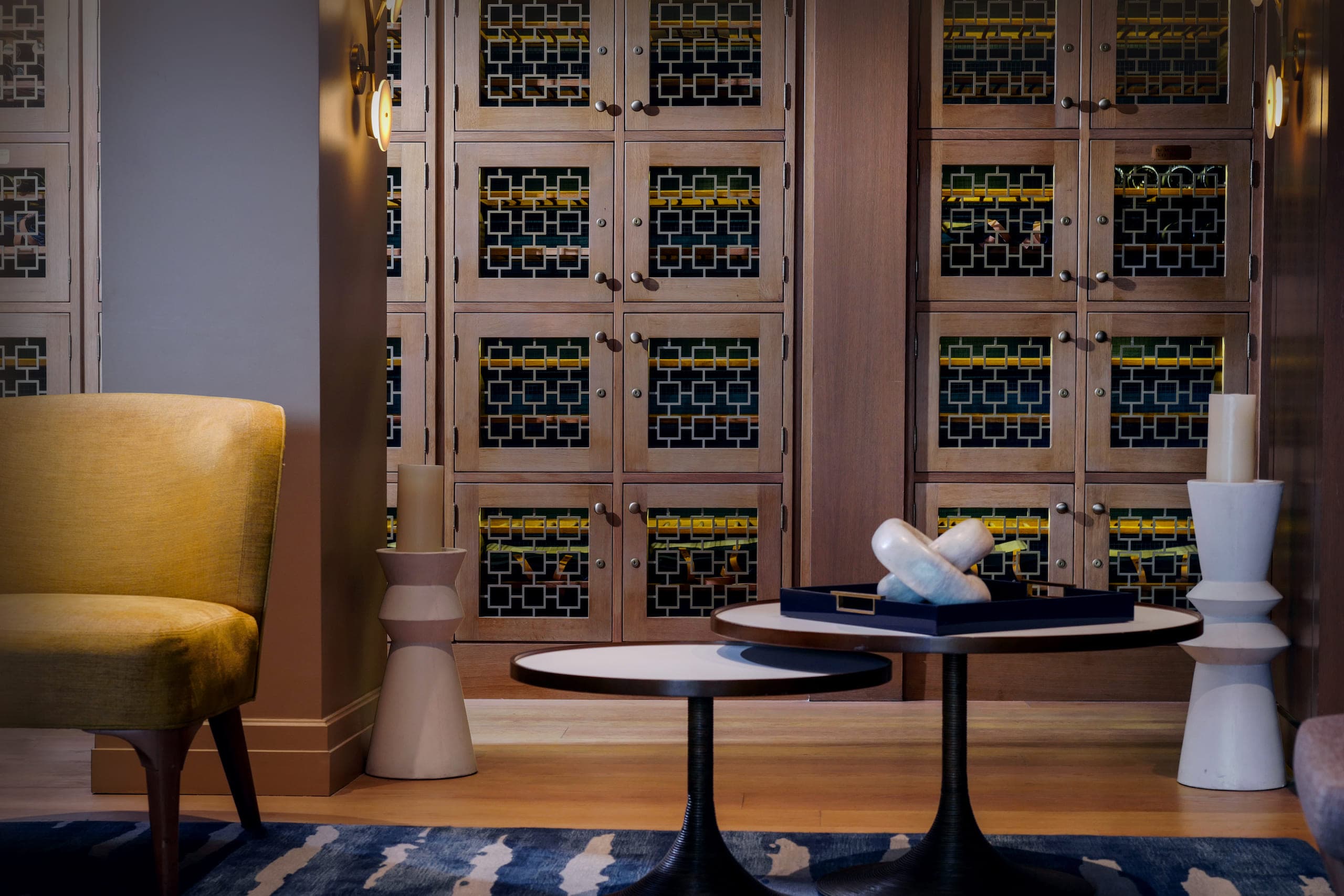A beautiful room with nesting circle side tables and perfect lighting