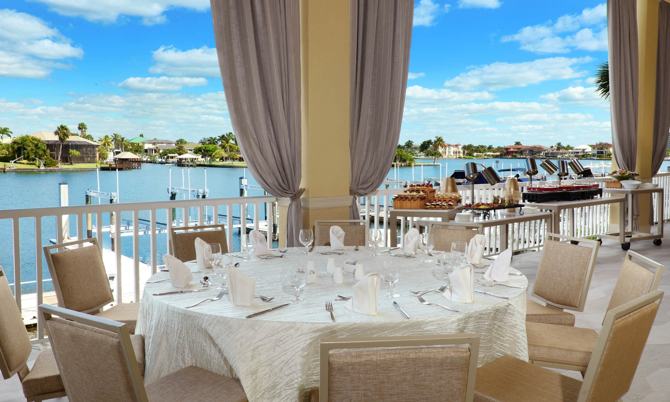 A round table set up for service on the Terrace