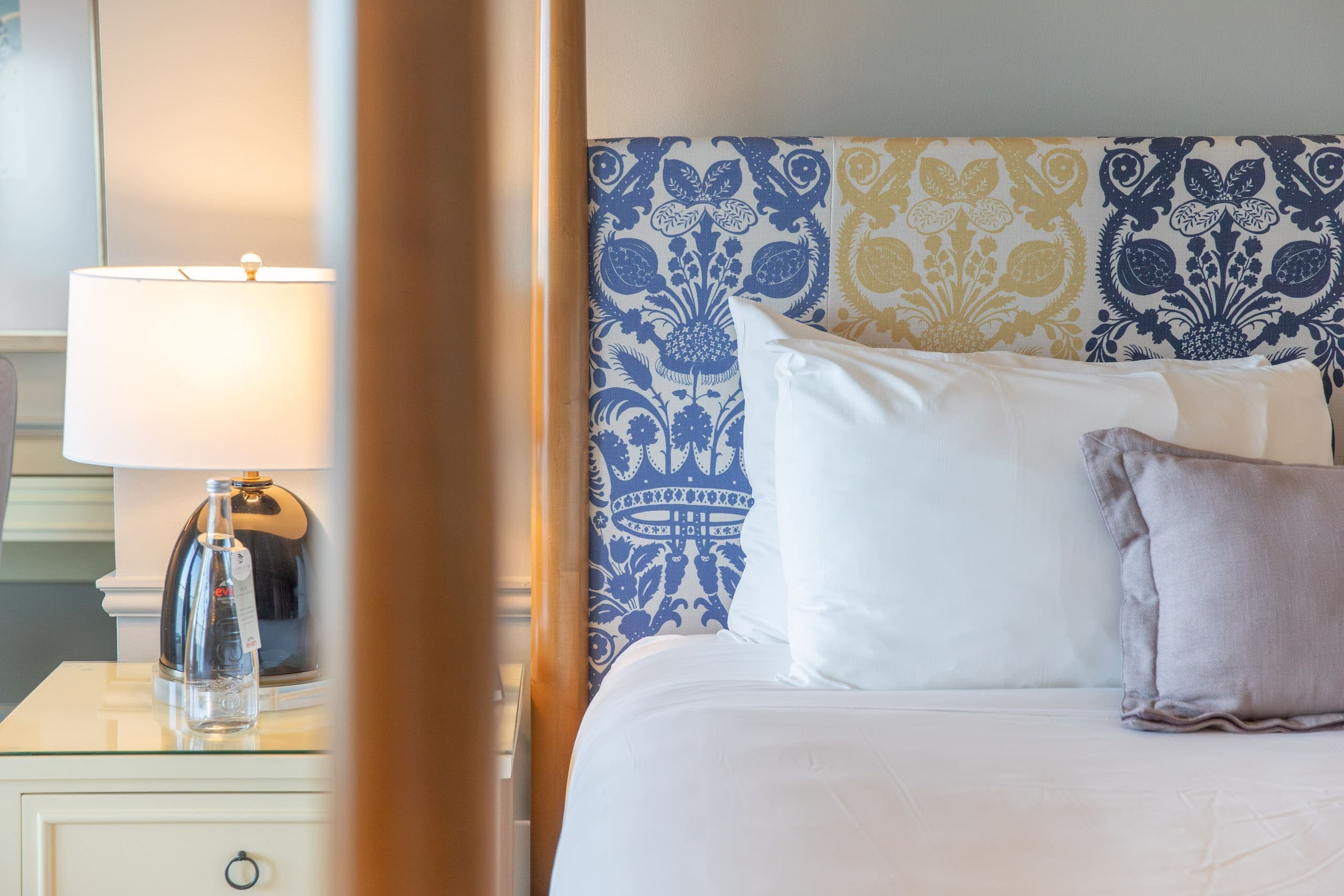 A bed in a Laplaya Beach Front king room