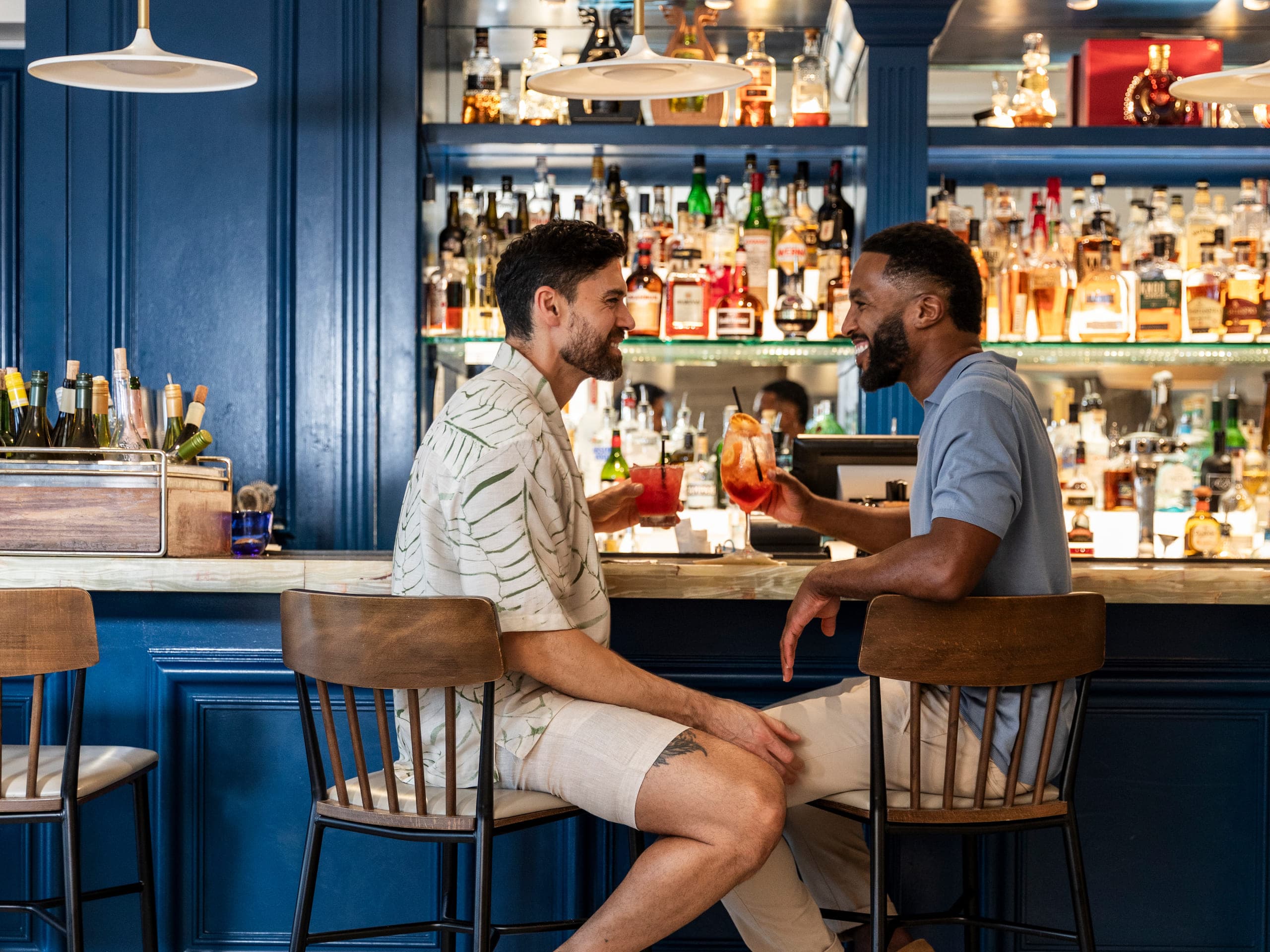 A couple sitting at the bar at elements bar