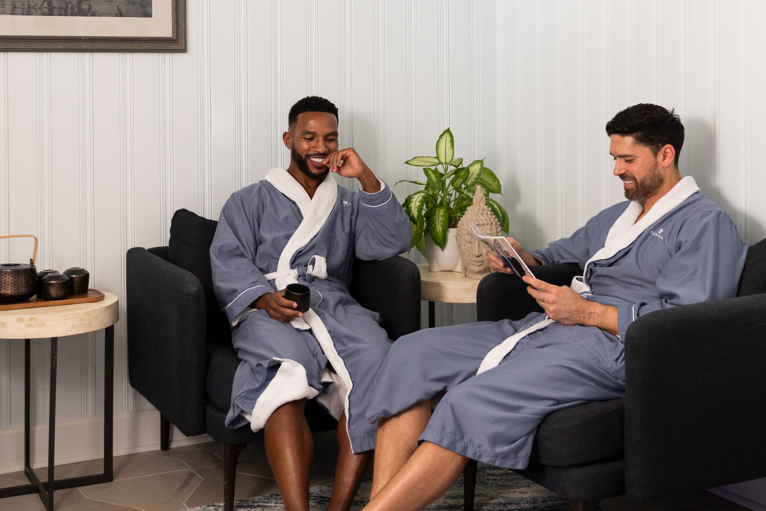 Two men waiting int he spa waiting area at SpaTerre