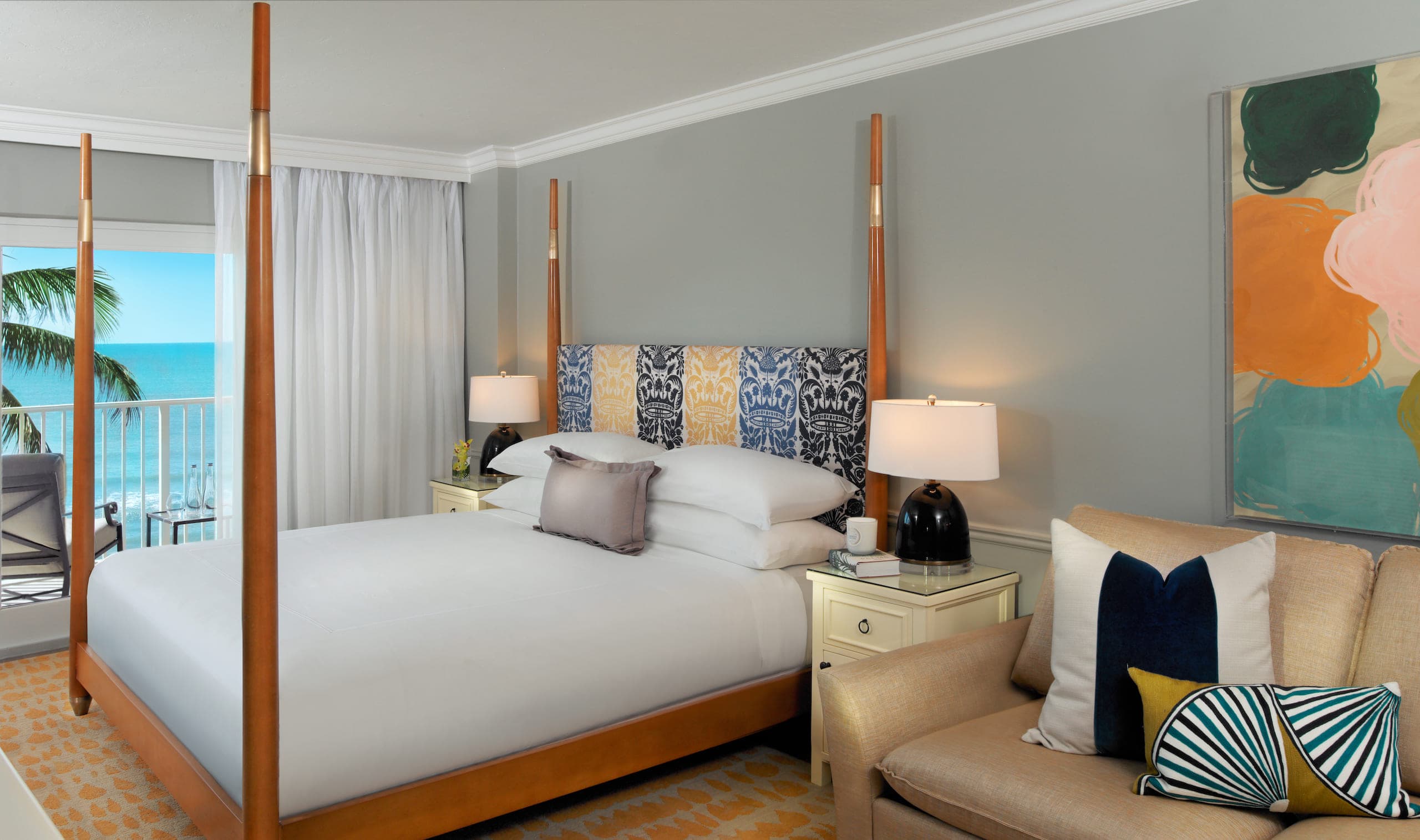 Queen bed with access to a balcony in a Gulf Tower room at LaPlaya