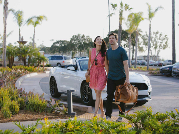 Couple entering La Playa Beach and Golf Resort