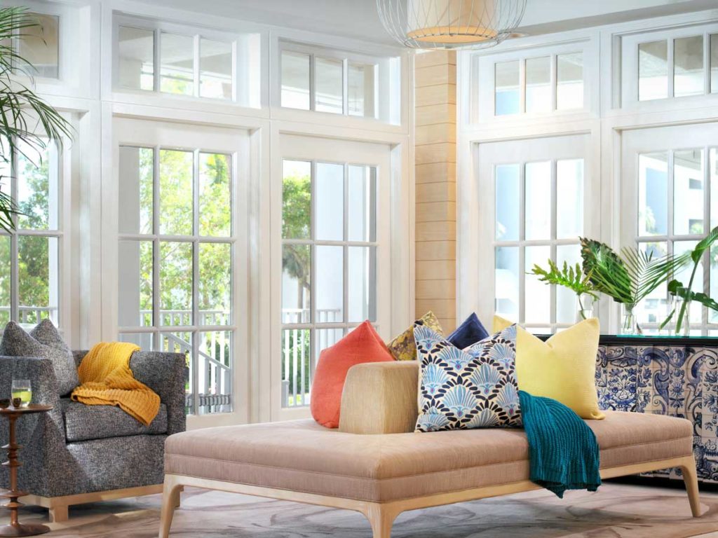 Ottoman and sitting area in the lobby at La Playa Golf and Beach Resort in Naples, FL