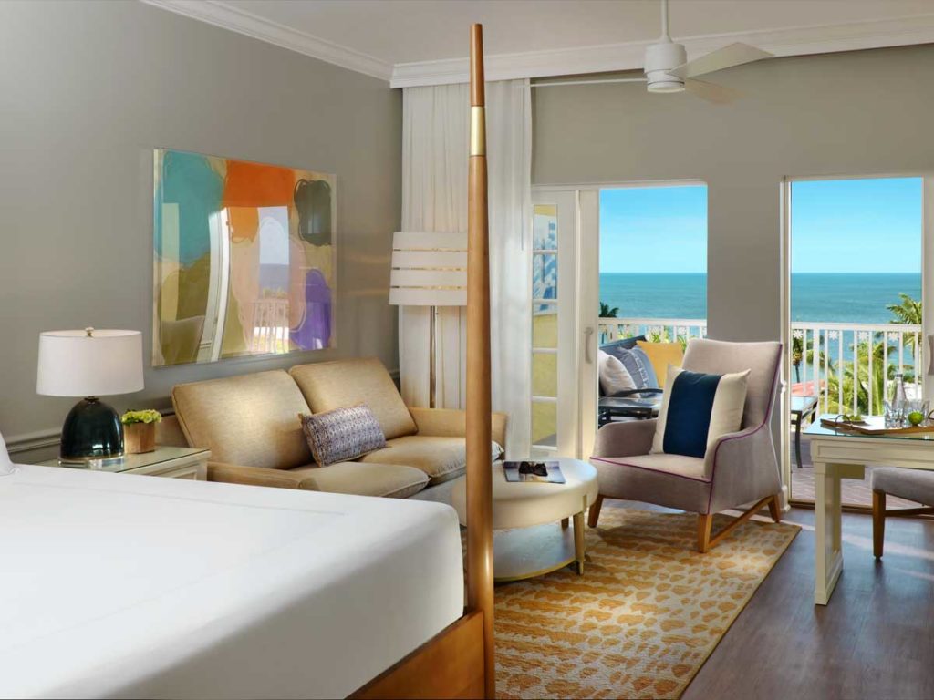 Signature Bay Tower Room with sitting area and beach view in Naples, FL