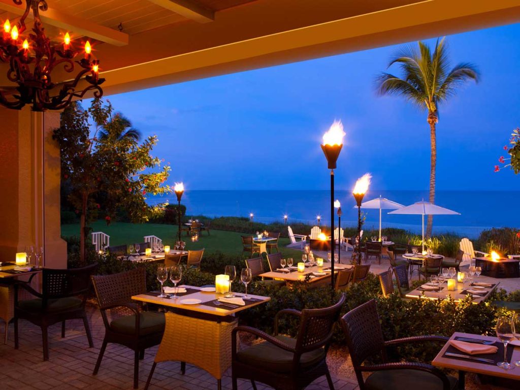 Baleen dining room with outdoor seating in Naples, Florida