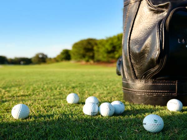 Golf bag with balls ready for a game at La Playa Beach and Golf Resort in Naples, FL