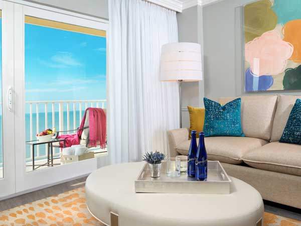 Guestroom suite with ocean view balcony in Naples, FL