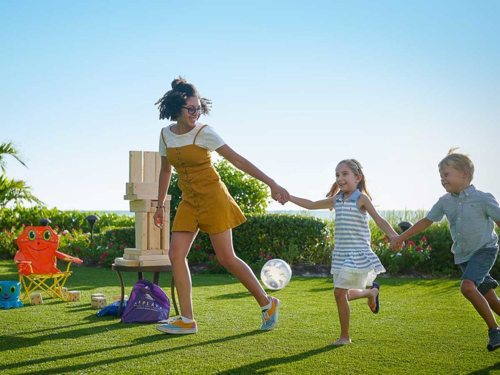 Family Playing Lawn Games Together.