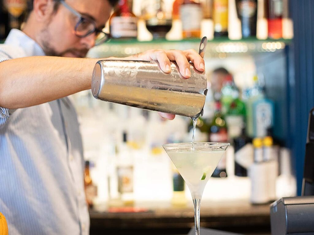 Bartender Pouring A Drink.